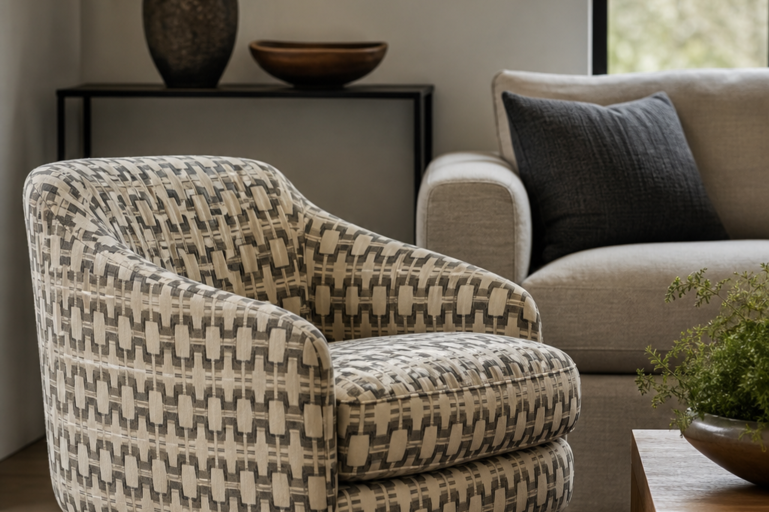 Geometric upholstery fabric shown in a finished interior so shoppers can judge room context, color, texture, and scale