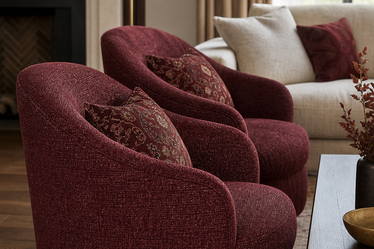 Red and burgundy upholstery fabric shown in a finished interior so shoppers can judge room context, color, texture, and scale
